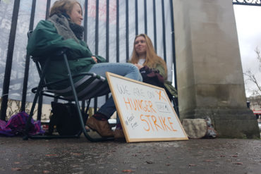 Two campaigners begin their hunger strike to persuade Cardiff University to stop investing in the fossil fuel industry.