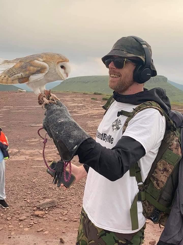 Jaylo Miles holding owl