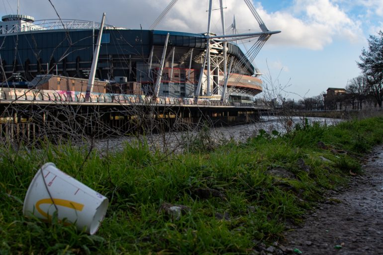 Plastic cup in front of stadium