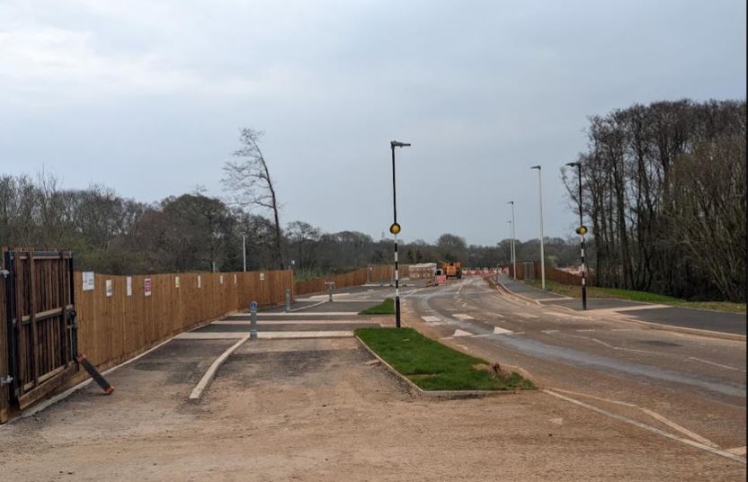The road leading to the planned housing estate 