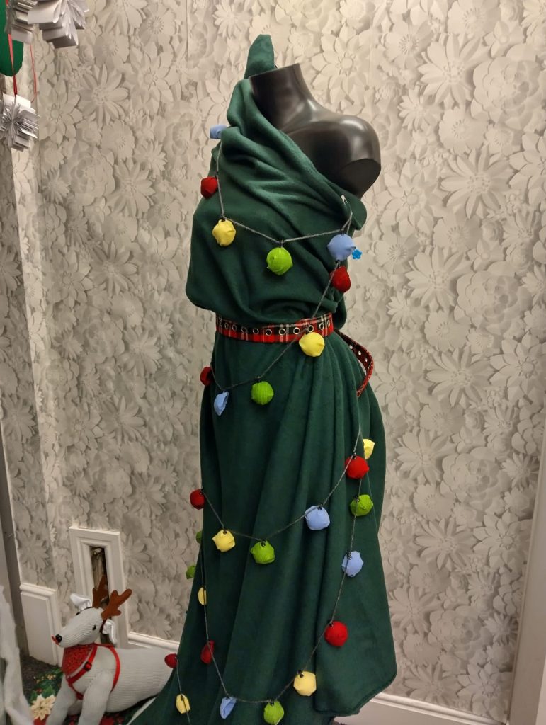 Mannequin styled to look like a Christmas tree